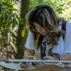Kailey working in the field